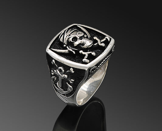 Sterling Silver Wide Band Ring with Skull and Crossbones Motif